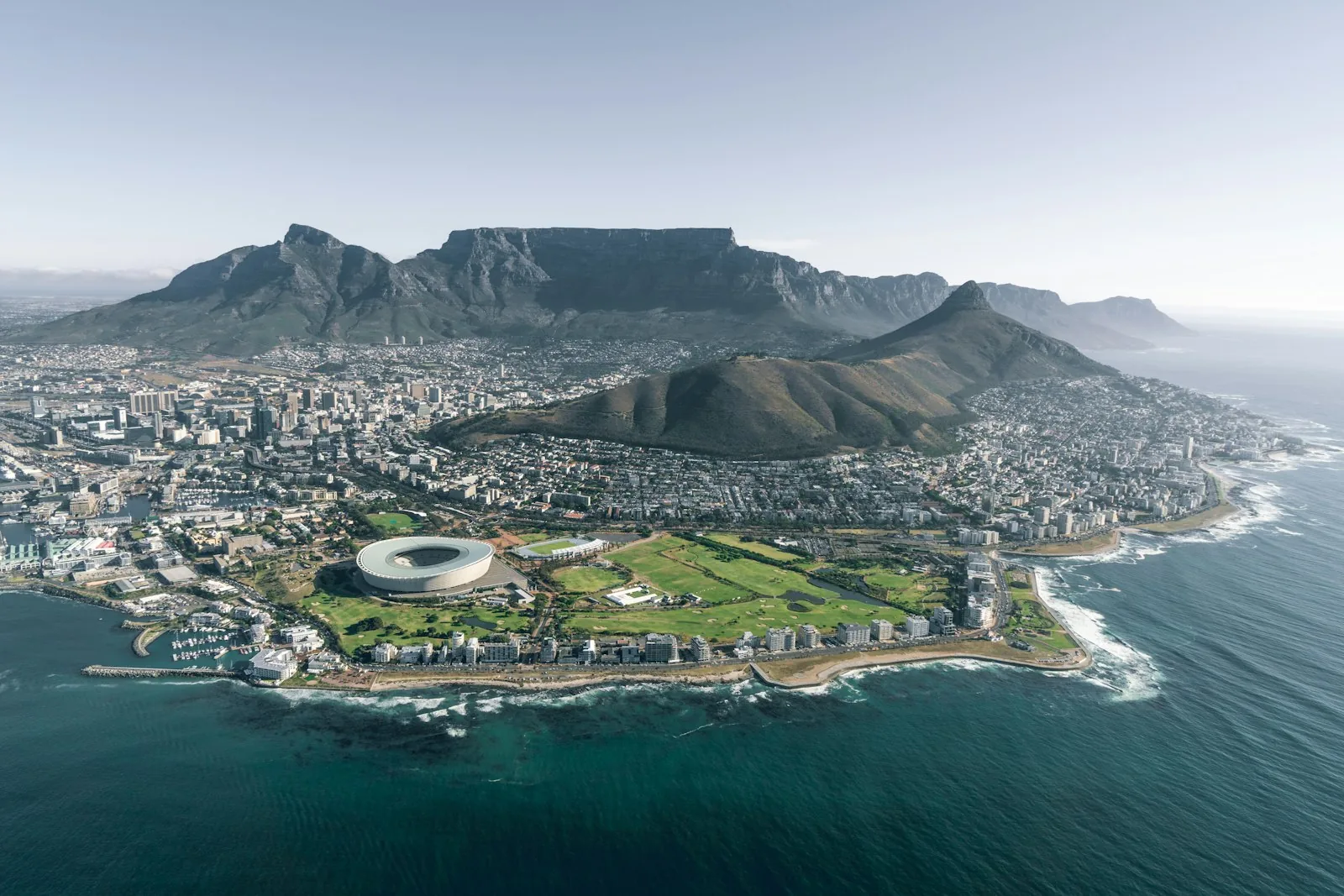Aerial view of a coastal African city, the economies and institutions we work across